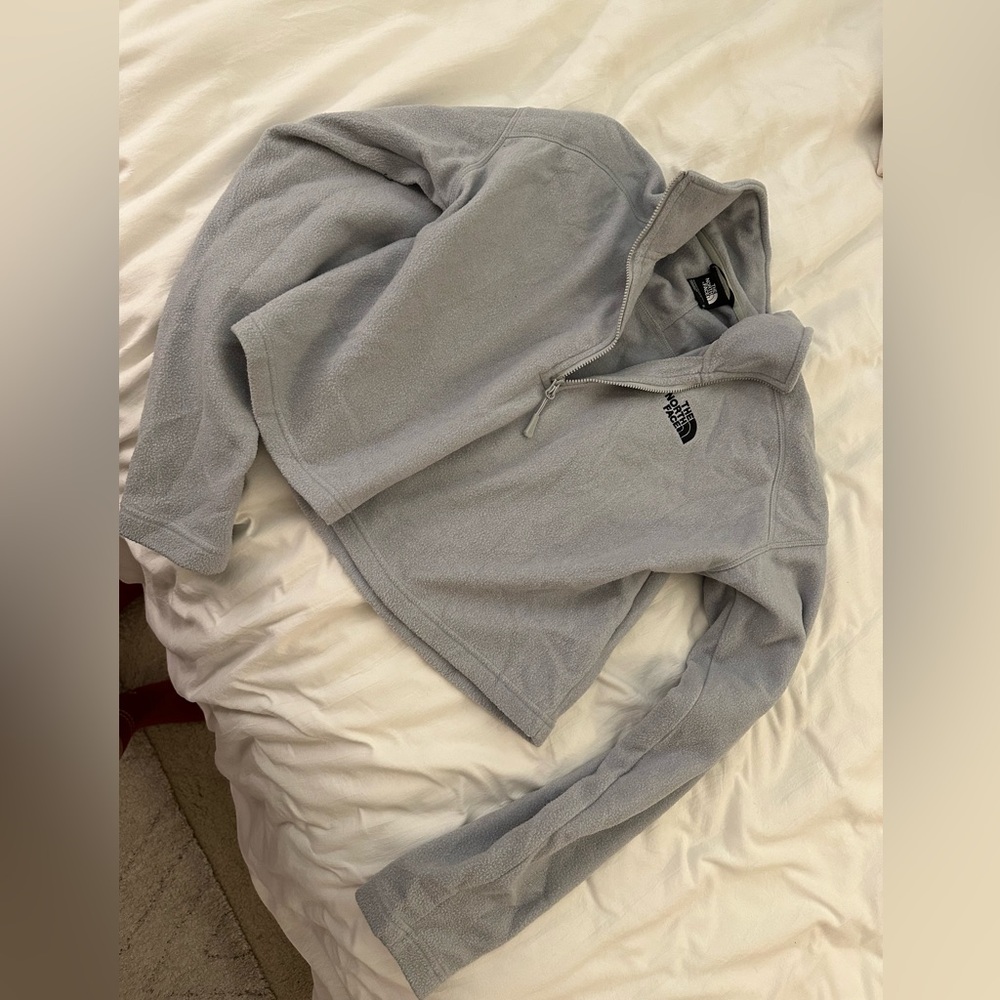Grey North face crop top 1/3 zip up. Worn a few times. Great condition